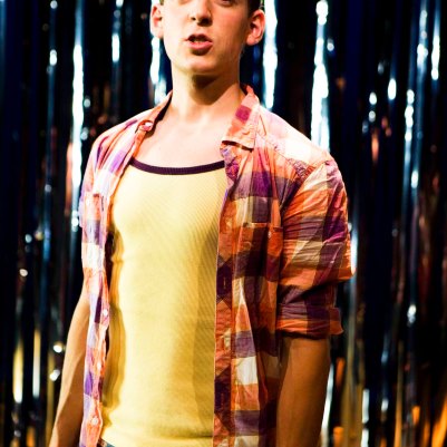 Dylan Kennedy (Seán) in All Over Town. Photo by Fiona Morgan